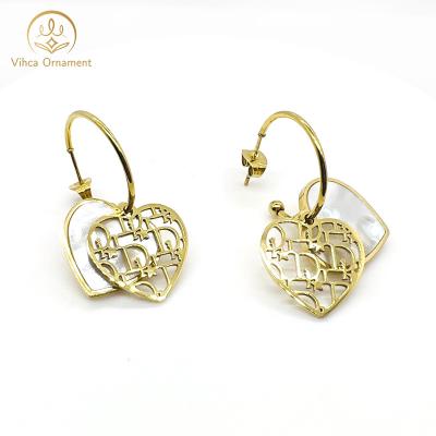 China Customized FASHIONABLE personalized bamboo xoxo circle horoscope name gold plated earrings 2022 zodiac sign circle earrings for sale