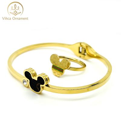 China FASHIONABLE gold and easy with mickey style stainless steel spring bracelet for women for sale