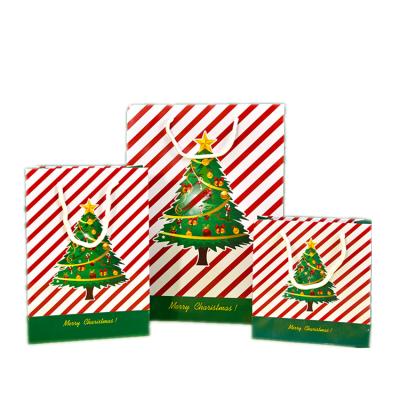 China Lovely Recyclable Custom Recycle Present Tree Print Christmas Candy Gift Bags for sale