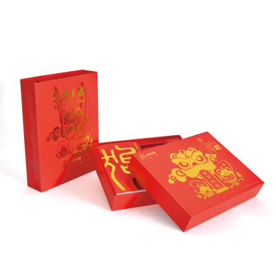 China Recycled Materials New Year Gift Set Notebook Calendar Envelope Red Gift Box for sale