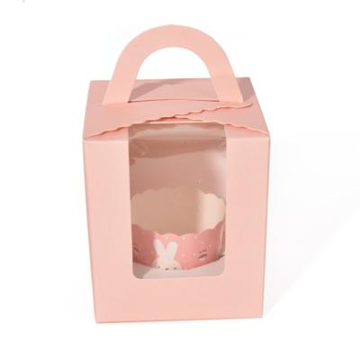 China 2021 Hot Selling Recycled Materials Pink Cake Box With Handle Custom Paper Box With Lovely Blue Cartoon for sale