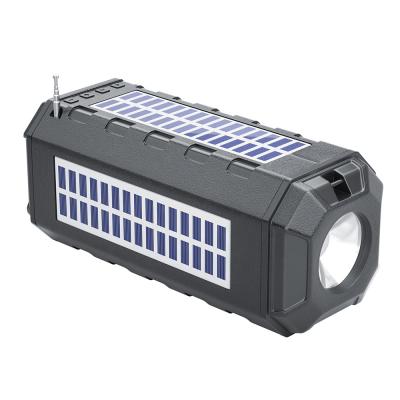 China Dual Solar Panel Solar Powered LED Flashing Light Belt HA02 Wireless Speaker Portable Outdoor Flashlight Speaker With FM Radio TF Card U Disk for sale