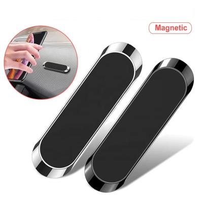 China N38 F6 Strong Magent Magnetic Mini Strip Paste Car Phone Stand for IPhone Xiaomi Samsung Wall Magnet GPS Car Mount Zinc Alloy Dashboard for sale