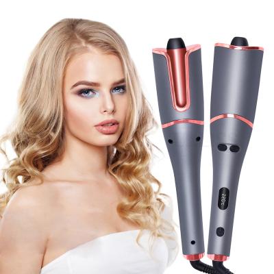 China Professional Auto Rotating Adjustable Temperature One Stage Hair Curler LCD Display Adjustable Heat Settings Anti-scald Hair Curling Iron for sale