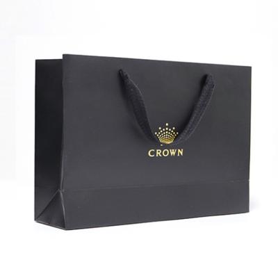 China Recyclable Recycled Cardboard Luxury Paper Custom Gift Bag With Handle For Shopping Bag With Your Own Logo for sale