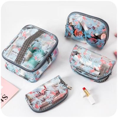 China Durable Clear Bird Printing Toiletry Bag Set Transparent PVC Waterproof Makeup Bags Portable 4 Pack Women Cosmetic Bag for sale