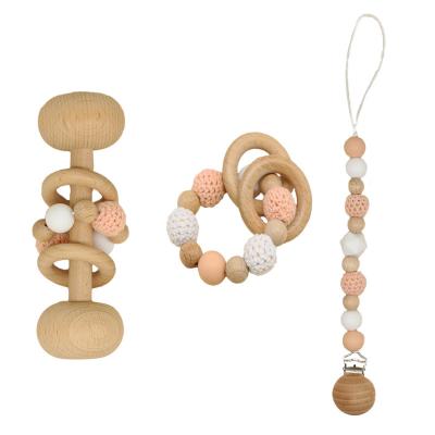 China Eco-Friendly Crochet Christmas Gift Baby Rattle Bab Newcoming Pram Toy Wooden Rattle Baby Carriage Clip Pacifier Chain Chewable Teething Beads for sale