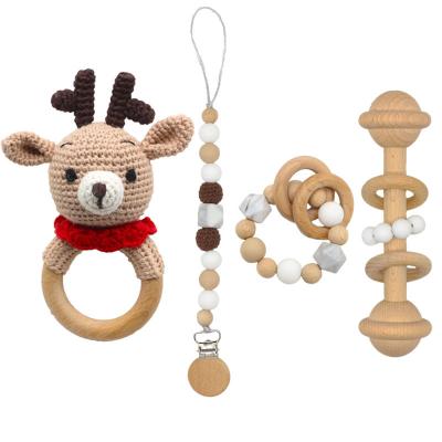 China Eco-Friendly Christmas Gift Set Newborn Teether Pacifier Chain Clip Wooden Crochet Bracelet Deer Ratchet Toys Baby Shower Gift Handmade for sale