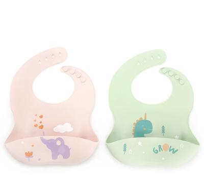 China Washable Adjustable Fit Bibs With Crumb Catcher Green Dinosaur Waterproof Baby Feeding Bibs Cartoon Silicone Bibs Newborn Gift for sale