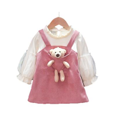 China Anti-wrinkle western style doll bear patchwork chic denim ribbed a line dress puff sleeves sunbath kids girls cotton long dress for sale