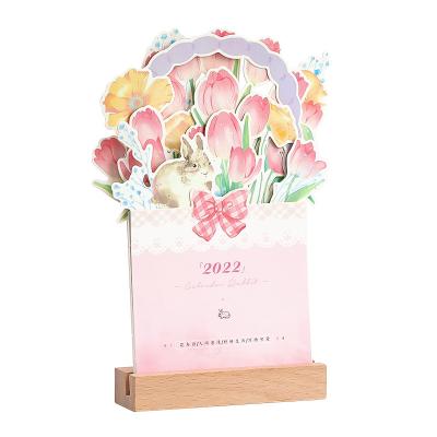 China Creative three-dimensional Table calendar custom printing laser cut engrave DIY flower desktop calendar with wooden base 2023 desktop ornaments for sale