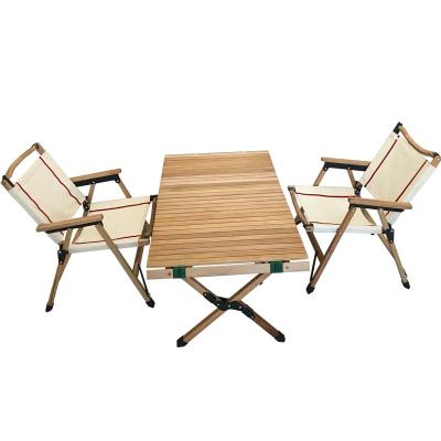 China OUTNESTS Beech Wood Desk Beach Egg Roll Easy-Carry Outdoor Foldable Camping Portable Wooden Folding Table for Picnic BBQ Table and Chair Suit for sale