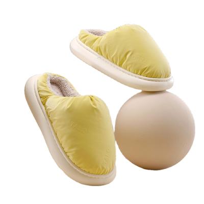 China Fashion trend unisex pineapple lightly waterproof bread down slippers warm cotton slippers women's comfortable thick unique home slippers for sale