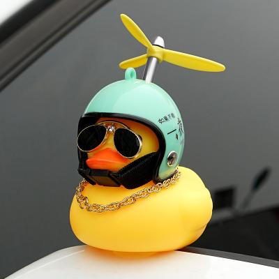 China Yellow Duck Decoration Car Accessories Center Console Bamboo Dragonfly Dragonfly Cartoon Helmet Glasses Necklace Comics Car Small for sale