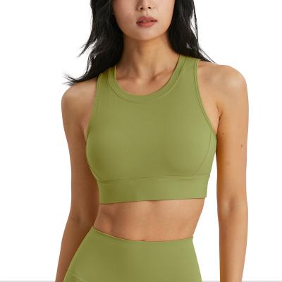 China New yoga seamless clothing semi-fixed cup ribbed tank top sports fitness vest backless bra for sale