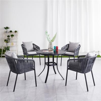 China Finished with soft aluminum frames and modern olefin cushions desgin dining set with rope weave chair dining table outdoor furniture for garden living for sale