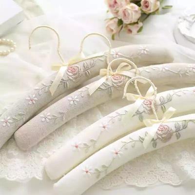 China Wholesale Top Level Embroidery White Satin Padded Clothes Hanger Hangers for sale