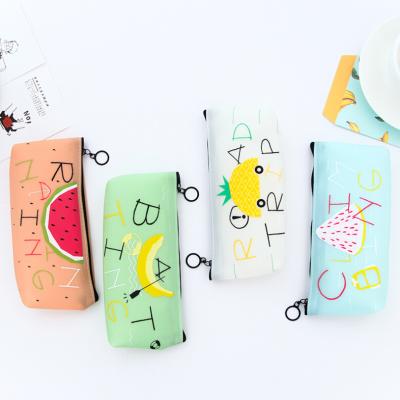 China Soft creative stationery bag student jelly stationery fresh fruit storage bag silicone triangle small girl pen bag for sale