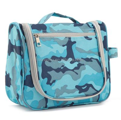 China Portable Hanging Cosmetic Organizer Travel Bag Camouflage Travel Bag Durable Women Fashion Wash Waterproof Travel Bag Folding With Hooks for sale