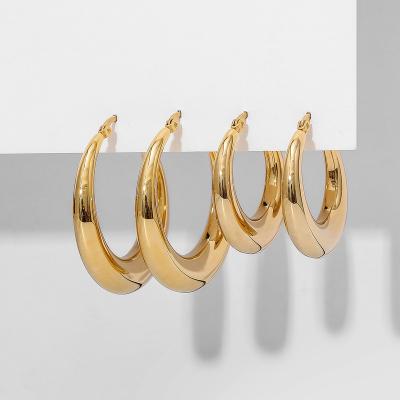 China FASHIONABLE titanium steel smooth crescent earrings 316L cavity real 18K gold plated stainless steel hoop earrings for sale