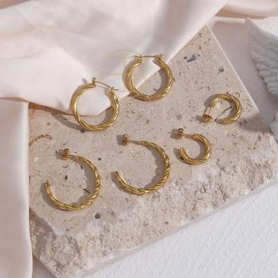 China FASHIONABLE minimalist twisted circle earrings stainless steel 18K gold stud earrings women accessories for sale