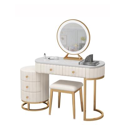 China Household Modular Light Stone Dressing Table Bedroom Luxury Fashion Makeup Small Chipboard Table With Drawer Storage Dressing Table for sale