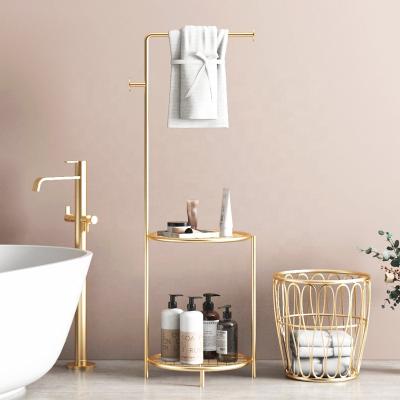 China Fashion Light Luxury Round Nordic Round Towel Rack Laundry Basket Iron Bathroom Shelf Bathroom Clothes Storage Shelf for sale