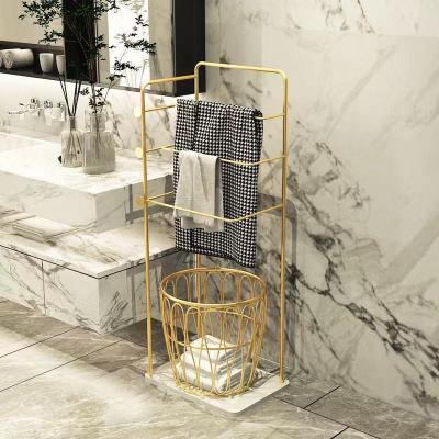 China Gold Simple Modern Marble Iron Floor Shelf Fashion Bathroom Towel Rack Bathroom Shelf for sale