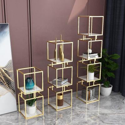 China Simple syanding bedroom shelf flower shelf storage rack living room partition shelf viable lightweight iron shelf for sale