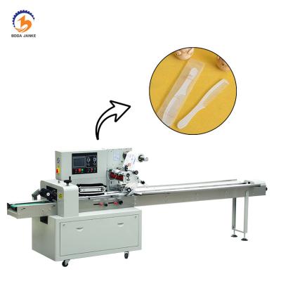 China Food Guangdong Maker Daily Necessities Packing Machine, Horizontal Comb Pillow Packing Machine for sale