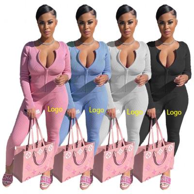 China Anti-pilling 2021 Fashion Two Piece Pants Set Women Winter Solid Color Long Sleeve Pit Strip Two Way Zipper Suit for sale