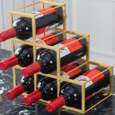 China Modern Wholesale Luxury Gold Metal 6 Bottles Stemware Storage Rack Rack Wine Rack for sale