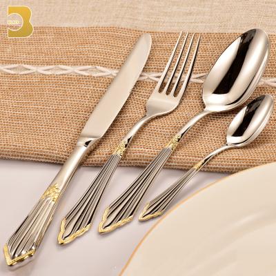 China Unique Design Luxury Dinnerware Silver Special Handle Stocked With Gold Details Stainless Flatware Sets for sale