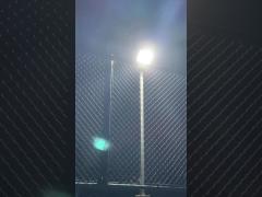 Floodlights illuminate the table tennis court