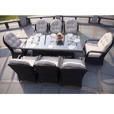 China Contemporary Modern Garden High Back 8 Seater Rattan Chairs Outdoor Dining Table Set And Glass Top Restaurant Furniture for sale