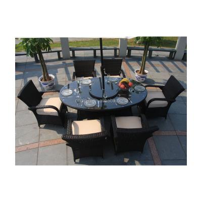 China New Rattan Hotel Patio 8 Seater Outdoor Chairs Restaurant Modern High Quality Oval Glass Top Dining Table Set for sale