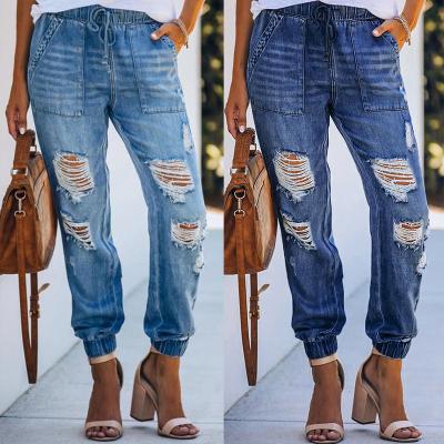 China New Amazon QUICK DRY elastic waist drawstring design ripped denim casual pants fashion Harlan women destroyed jeans pants for sale