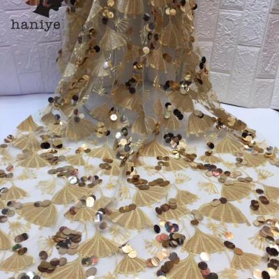 China Viable New Style Nigerian Lace Fabric With Sequin Tulle Net Lace Sequins Lace Fabric African For Party for sale