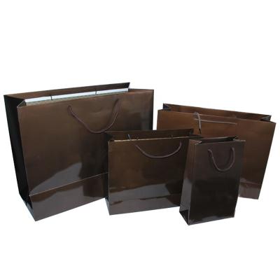 China Recyclable Custom Logo Smooth Outdoor Gift Paper Bag With Handle for sale