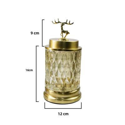 China Outdoor Freshness Keeping Christmas Decoration Metal With Lid Crystal Glass Candy Jar for sale