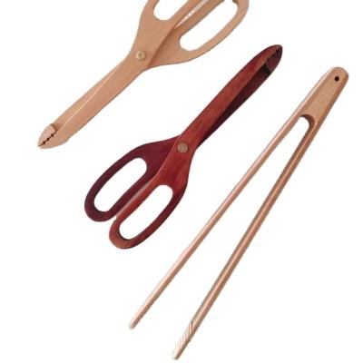 China Sustainable Wholesale Home Kitchen Tools Bamboo Cooking Tongs,Food Tool Salad Bacon Steak Bread Cake Wooden Clip for sale