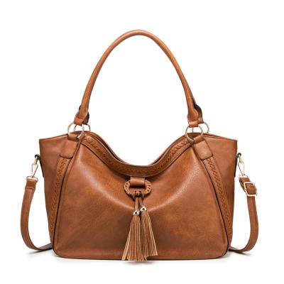 China Lady New Hot Sale Tramp Bags Women Handbags Large Capacity Leather Shoulder Bags With Tassel for sale