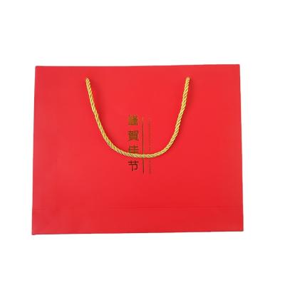 China Factory Custom Recyclable Hot Red Gold Stamping Paper Bag Wedding Gift Bag Packaging Bag for sale