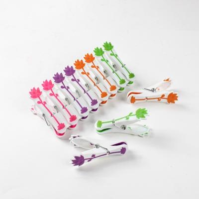 China Multifunctional wide spread well know plastic lotus clothespin 24 clothes clips clothespins for home use wasknijpers plastic clips for clothes for sale