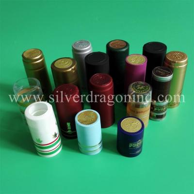 China Burgundy PVC shrink capsules,size 34x65mm, for drink sealing, with tear strip for sale