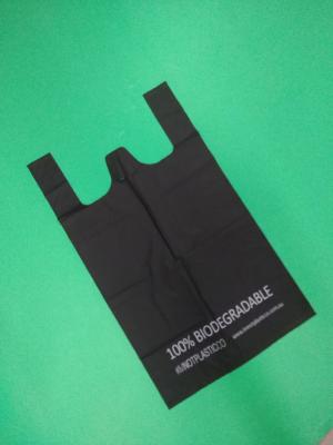 China 100% biodegradable black T-shirt bag, 1 color 1 side printed, size 0.025mm x (30+15)x50cm, withstand 5kg for sale