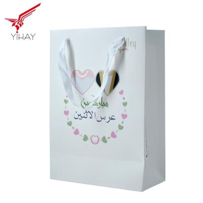 China Decorative Personalised Paper Bags Waterproof Kraft Bags With Handles for sale