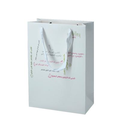 China Popular Personalised Paper Bags White Foldable With Flat Rope Handles for sale