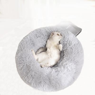 China Travel Pet Products Best Selling Plush Round Fabric Shaped Moisture Proof Dog Beds for sale