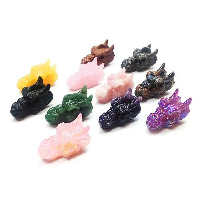 China Wholesale Natural Crystal Dragon Head China Rose Quartz Carved Dragon Head Skulls for sale